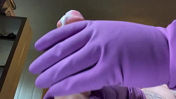 Stroking that hard cock in gloves