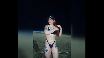 Red haired masseuse on copacabana beach