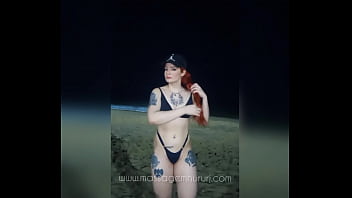 Red haired masseuse on copacabana beach