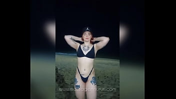 Red haired masseuse on copacabana beach