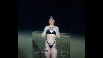 Red haired masseuse on copacabana beach