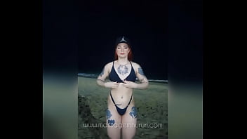 Red haired masseuse on copacabana beach