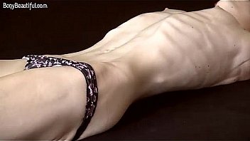 Skinny fitness model poses topless Skinny fitness model poses topless