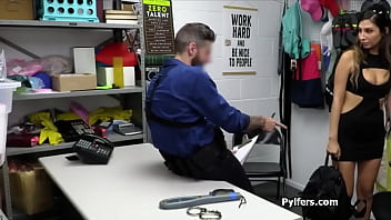 Exotic brunette gets on her knees at the backoffice