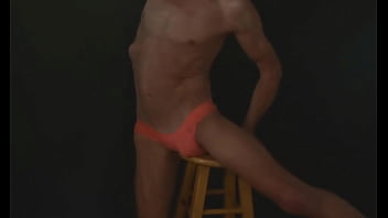 Part 2 down in the dark sneak a peek preview groin stretching on the stool with dark background and bright briefs with the light off