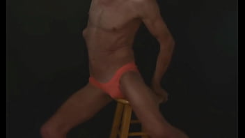 Part 2 down in the dark sneak a peek preview groin stretching on the stool with dark background and bright briefs with the light off