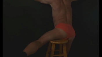 Part 2 down in the dark sneak a peek preview groin stretching on the stool with dark background and bright briefs with the light off