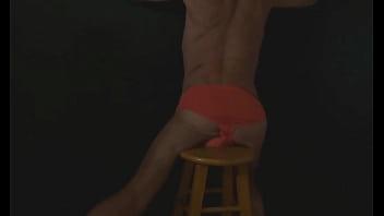 Part 2 down in the dark sneak a peek preview groin stretching on the stool with dark background and bright briefs with the light off