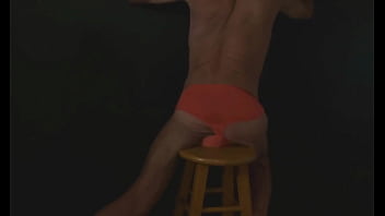 Part 2 down in the dark sneak a peek preview groin stretching on the stool with dark background and bright briefs with the light off