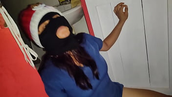 The whore put on a balaclava and makes porn from her work warehouse showing her mature vagina