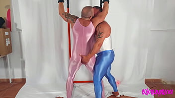 Shiny Spandex Covered Bdsm Muscle Men thumbnail