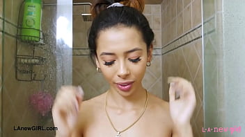 Graceful asian beauty enjoys a sensual bath