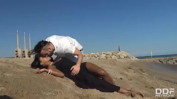 Stranded thankful & dark babe swallows big cock