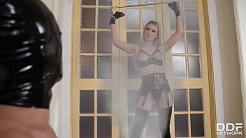 Russian latex femdom babe takes charge of submissive stud