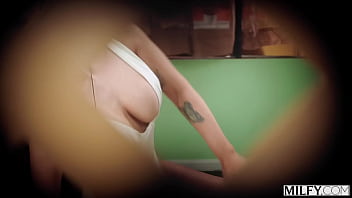 A sunbathing trophy wife seduces a peeping tom