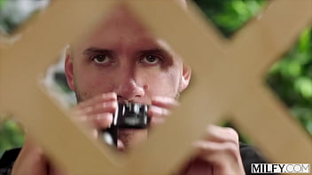 A sunbathing trophy wife seduces a peeping tom