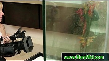 Busty masseuse gives pleasure during massage 02