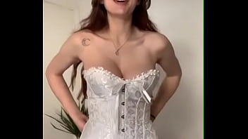 Girl singing in a corset