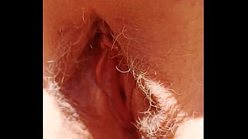 Sexy mature shows her hairy spread eagle cunt