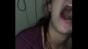 Girl gives roomate blowjob while he plays