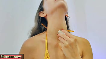 Gold micro bikini ice cube surfing on my body posing for you