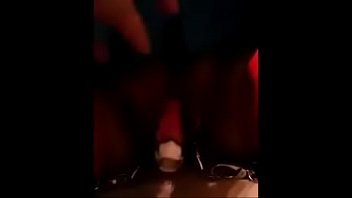 Woman wearing red panties is stimulating the clitoris