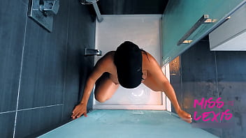 Babe rubbing pussy while showering