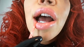 Shiny latex milf plays with huge tities