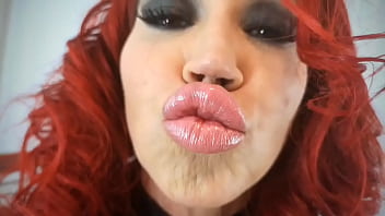 Shiny latex milf plays with huge tities