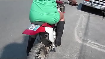 Girl revving a dirtbike