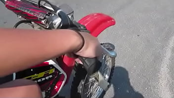 Girl Revving A Dirtbike thumbnail