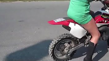 Girl revving a dirtbike