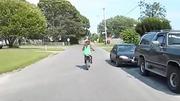 Girl revving a dirtbike Girl revving a dirtbike