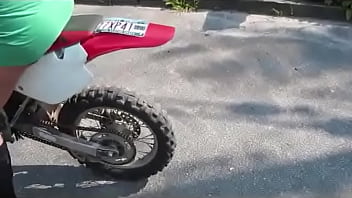 Girl revving a dirtbike