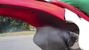 Girl revving a dirtbike