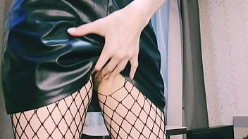 An aunt with glasses and fishnet tights is flirting with you