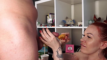 Redhead in skirt blows like a goddess