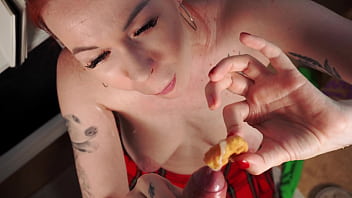 Redhead in skirt blows like a goddess