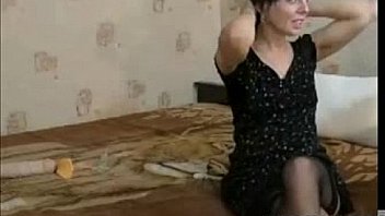 Sexy cute mature in stockings and dress dildos herself