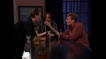 Two sexy lesbians play with a big dildo and lick each other