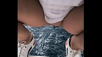 Arielarider public pissing from a boat into the sea