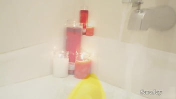 Sara jay plays with wax & her pussy during a bubble bath in jacuzzi
