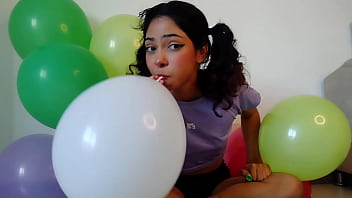 Pigtailed blowing and having fun