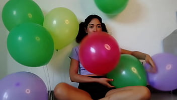 Pigtailed blowing and having fun