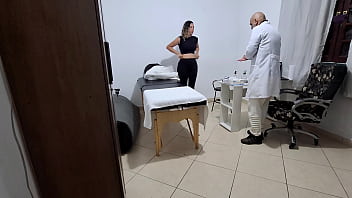 A milf gets fingered by the proctologist during an anal exam