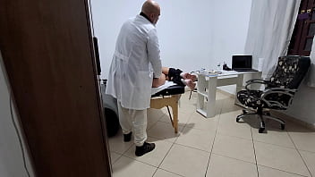 A milf gets fingered by the proctologist during an anal exam