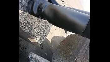Fetish rubber boots at beach Fetish rubber boots at beach