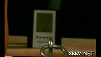 Savory bombshell is sitting on her fake penis