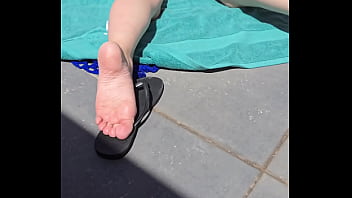 Sunbathing naked feet angle