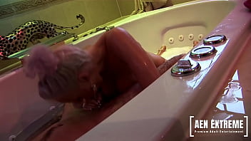 Blonde porn stars have a threesome in a jacuzzi tub